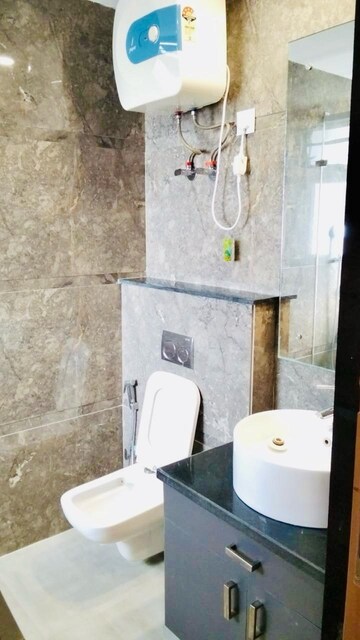 Bathroom in 4 BHK Builder Floor at Ansal Sushant Lok I, Sector 43 – for Rent