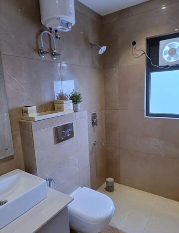Bathroom in 3 BHK Apartment at Suncity Vatsal Valley, Gwal Pahari – for Sale