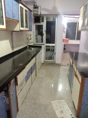 Kitchen in 2 BHK Apartment at Cosmos Heritage, Manpada – for Rent