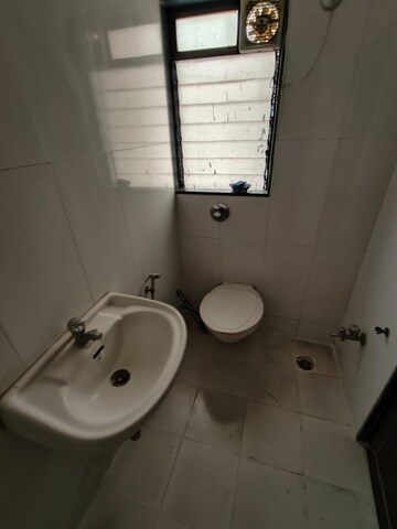 Bathroom in 1.5 BHK Apartment at Vijay Orovia, Ghodbunder Road – for Rent
