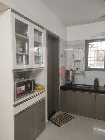 Kitchen in 2 BHK Apartment at Yashoda Heights, Warje – for Sale