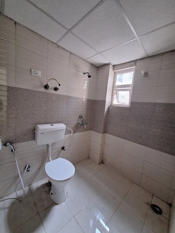 Bathroom in 2 BHK Apartment at Signature Global Grand Iva, Sector 103 – for Sale