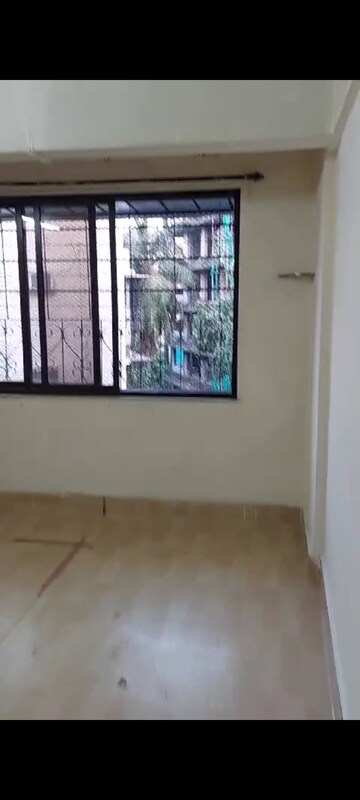 Room in 2 BHK Apartment at Rajasthan CHS, Andheri East – for Sale