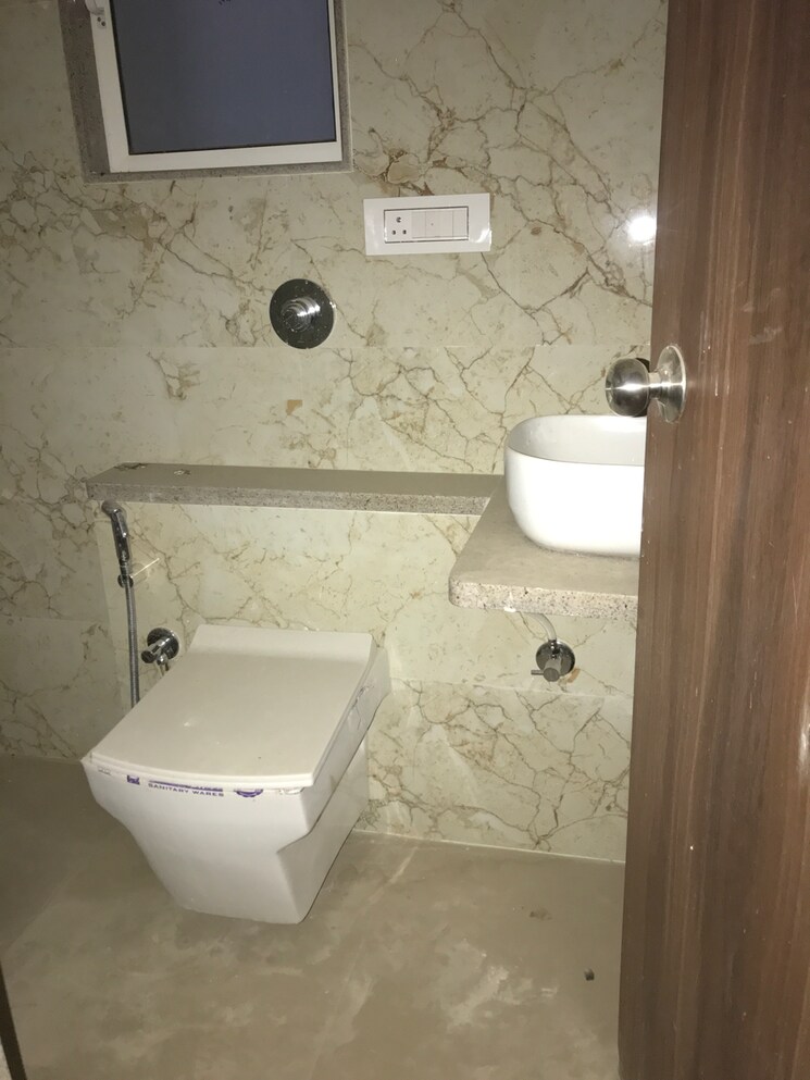 Bathroom, divine-blue-star-chs 2 Bedroom 569 Sq.Ft. Apartment In Ic Colony Mumbai 7926328