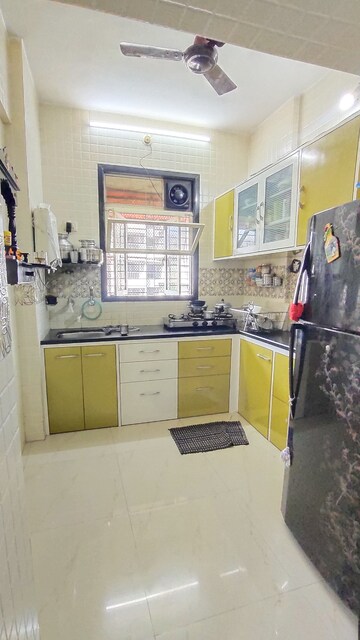 Kitchen in 2 BHK Apartment at Vrindavan Complex Dombivli West, Dombivli West – for Sale