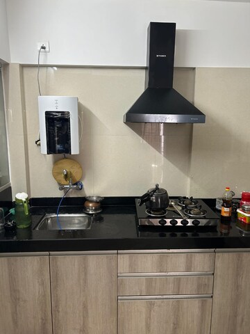 Kitchen in 2 BHK Apartment at Shree Venkatesh Graffiti Glover, Keshav Nagar – for Rent