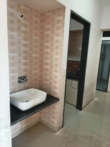 Bathroom in 2 BHK Apartment at Shree Tirupati STG Signature Residency, Ghodbunder Road – for Rent