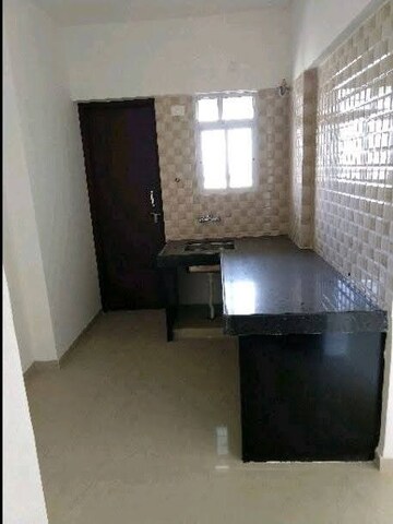 Kitchen in 1 BHK Apartment at Sara City, Chakan – for Sale