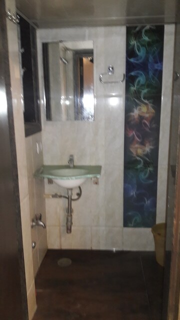 Bathroom in 2 BHK Apartment at New Dindoshi Hill View, Goregaon East – for Rent