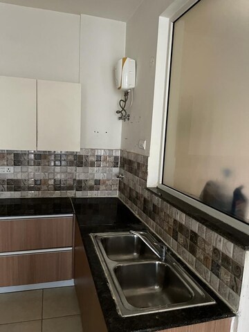 Kitchen in 3 BHK Apartment at Sushma Crescent, Dhakoli Village – for Rent