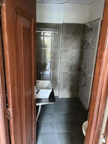 Bathroom in 3 BHK Apartment at Sushma Crescent, Dhakoli Village – for Rent