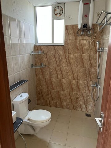 Bathroom in 3 BHK Apartment at Sushma Crescent, Dhakoli Village – for Rent
