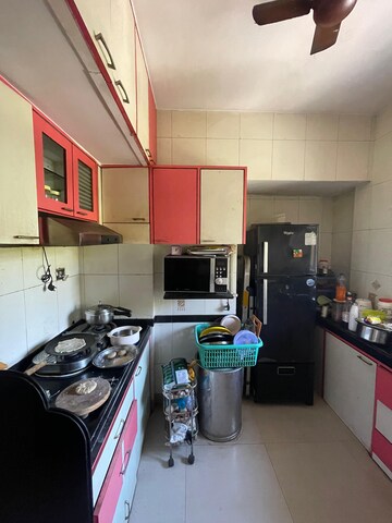 Kitchen in 1 BHK Apartment at Vaibhav Vilas CHS, Majiwada – for Rent