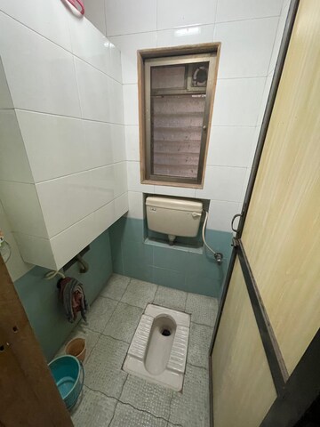 Bathroom in 1 BHK Apartment at Vaibhav Vilas CHS, Majiwada – for Rent
