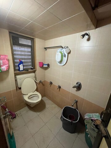 Bathroom in 1 BHK Apartment at Vaibhav Vilas CHS, Majiwada – for Rent