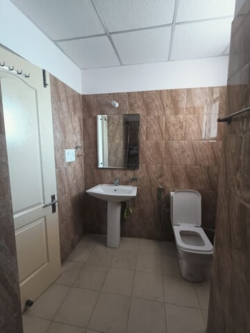 Bathroom in 3 BHK Apartment at Sushma Elite Cross, Dhakoli Village – for Sale