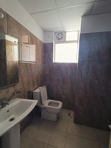Bathroom in 3 BHK Apartment at Sushma Elite Cross, Dhakoli Village – for Sale
