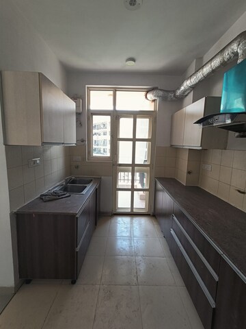 Kitchen in 3 BHK Apartment at Sushma Elite Cross, Dhakoli Village – for Sale