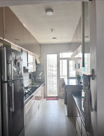 Kitchen in 3 BHK Apartment at Urban Axis Urban Woods, Sushant Golf City – for Rent