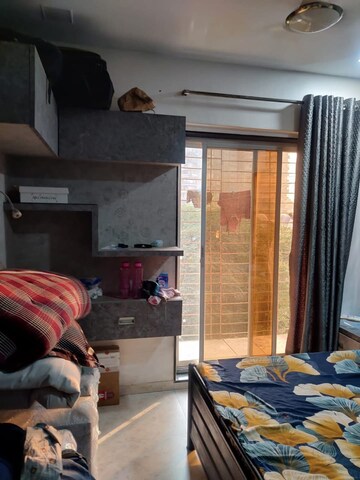 Living Room in 1 BHK Apartment at Coronet Building, Kandivali East – for Rent
