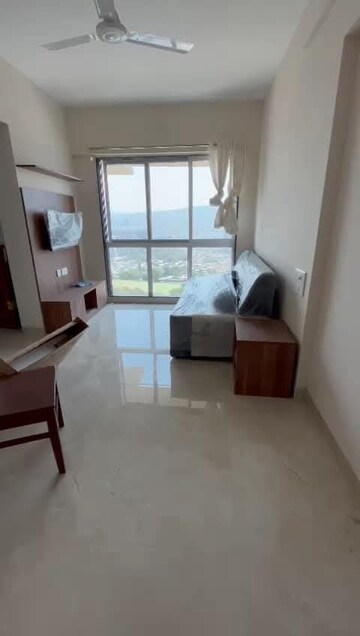 Living Room in 1 BHK Apartment at Surya Gokul Gagan, Kandivali East – for Rent