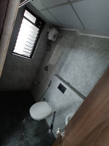 Bathroom in 1 BHK Apartment at Lodha Downtown, Dombivli East – for Rent