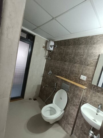 Bathroom in 1 BHK Apartment at Lodha Downtown, Dombivli East – for Rent