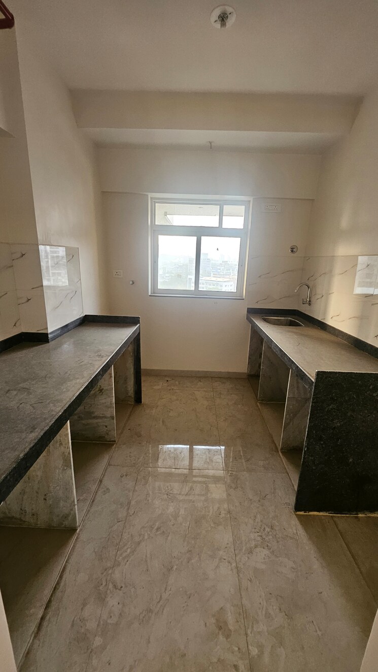 Kitchen, 118-west 2 Bedroom 755 Sq.Ft. Apartment In Agripada Mumbai 7927924