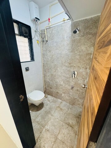 Bathroom in 2 BHK Apartment at Pramukh Heights, Andheri West – for Sale