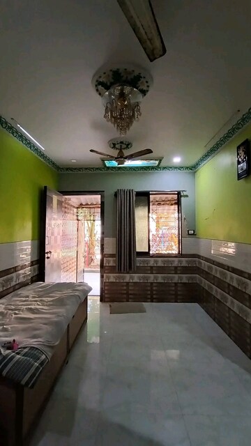 Bedroom in Studio Apartment at Agarwal Krish Garden, Nalasopara West – for Sale