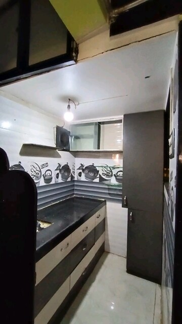 Kitchen in Studio Apartment at Agarwal Krish Garden, Nalasopara West – for Sale