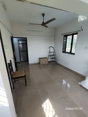 Living Room in 1 BHK Apartment at Parsian CHS, Andheri West – for Rent