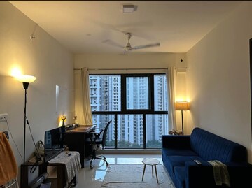 Living Room in 2 BHK Apartment at Lodha Crown Quality Homes, Majiwada – for Rent