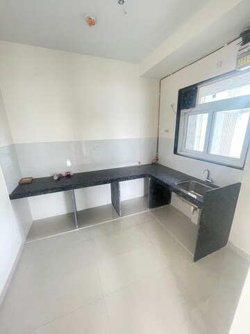 Kitchen in 2 BHK Apartment at Ashar Axis, Majiwada – for Rent