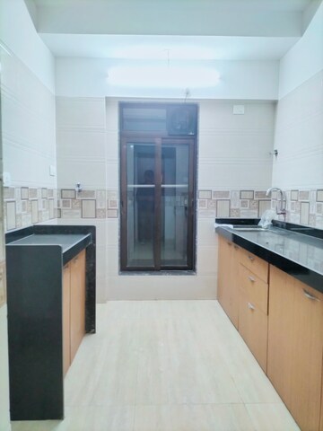 Kitchen in 2 BHK Apartment at Je and Vee Vrindavan, Malad East – for Rent