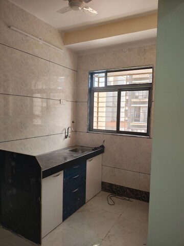 Kitchen in 1 BHK Apartment at Srushti Shri Rajendra Srushti, Palghar – for Sale