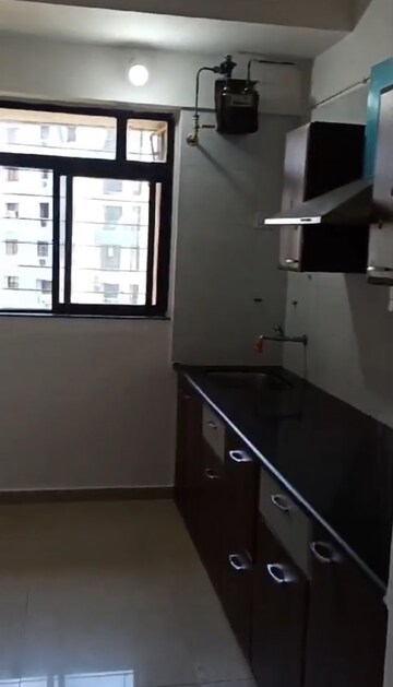 Kitchen in 1 BHK Apartment at Puranik City Phase III, Ghodbunder Road – for Rent