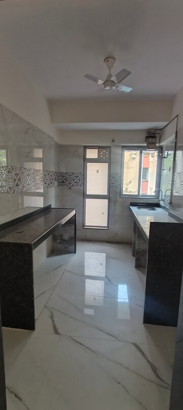 Kitchen in 3 BHK Apartment at Tilak Nagar Building, Tilak Nagar – for Sale