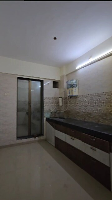 Kitchen in 2 BHK Apartment at Boisar – for Rent