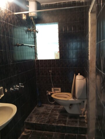 Bathroom in 2 BHK Apartment at Alica Nagar CHS, Kandivali East – for Rent