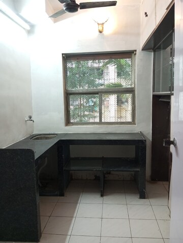 Kitchen in 2 BHK Apartment at Alica Nagar CHS, Kandivali East – for Rent