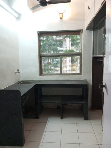 Kitchen in 2 BHK Apartment at Alica Nagar CHS, Kandivali East – for Rent