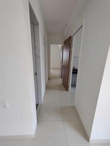 Building Lobby in 1.5 BHK Apartment at Godrej Emerald, Ghodbunder Road – for Rent