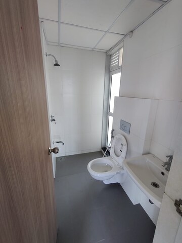 Bathroom in 1.5 BHK Apartment at Godrej Emerald, Ghodbunder Road – for Rent