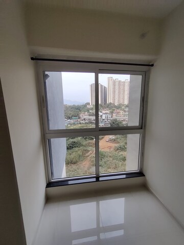 Room in 2 BHK Apartment at Godrej Emerald, Ghodbunder Road – for Rent