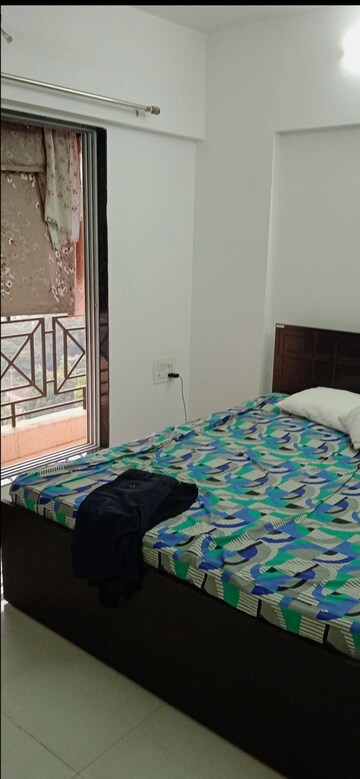Bedroom in 2 BHK Apartment at Cosmos Habitat, Majiwada – for Rent