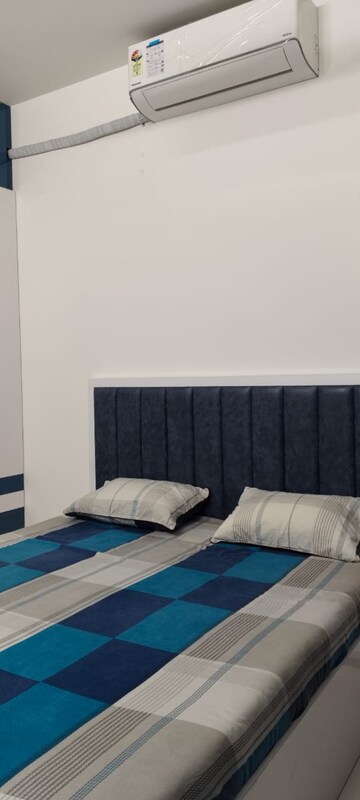Bedroom in 2 BHK Apartment at Rajesh Raj Infinia, Malad West – for Rent