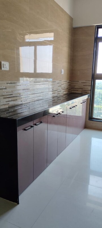 Kitchen in 2 BHK Apartment at Rajesh Raj Infinia, Malad West – for Rent