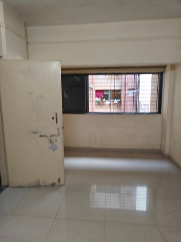 Room in 1 BHK Apartment at Nisarg CHS Seawoods, Seawoods – for Rent