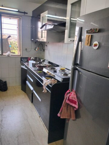 Kitchen in 3 BHK Apartment at Juhu Abhishek Chs Ltd, Andheri West – for Rent